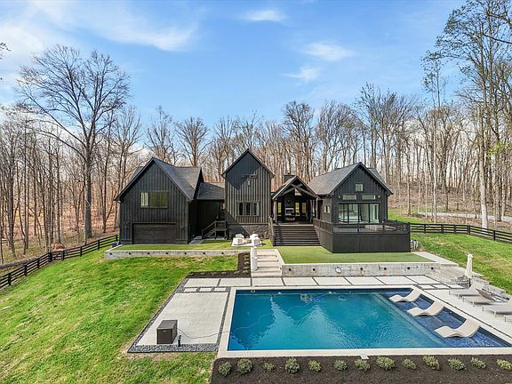 Check out the windows!! 11 private, gated acres in Tennessee. $2,499,900.
