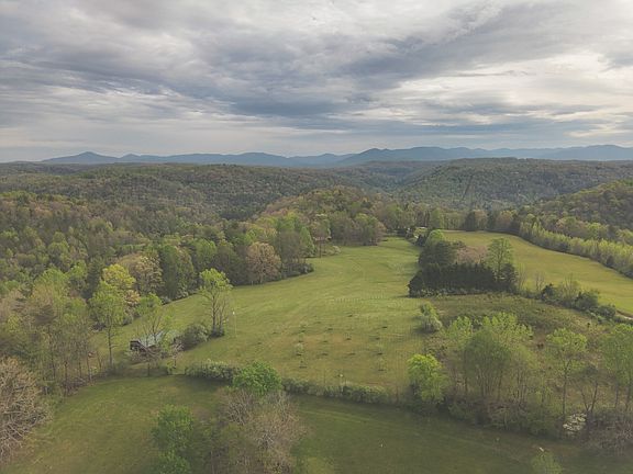 Check out that stone archway! 93 breathtaking acres in Tennessee. $1,400,000.