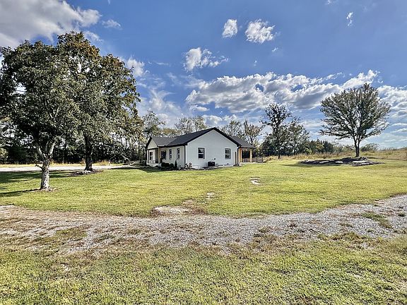 Check out the dog room! Rebuilt ranch on 17 acres in Tennessee. $879,000.
