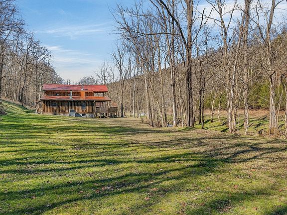 Check out the covered bridge!! Over 54 acres with a creek in Tennessee. $910,000.