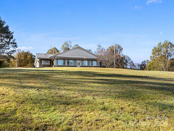 Check out those 360 views!! 38 mountaintop acres in North Carolina. $1,695,000.
