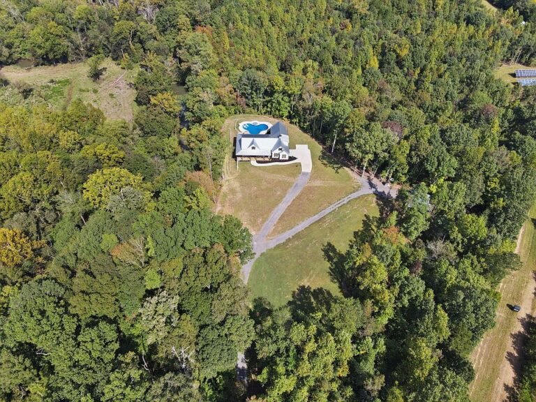 Check out the backyard oasis! Off-grid modern farmhouse on 53 acres in Tennessee. $1,675,000.