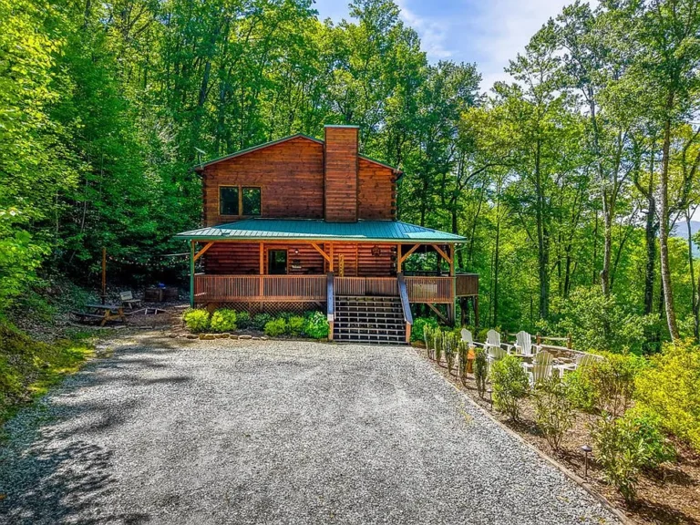 Mountain views for miles! Private retreat on 2+ acres in NC. $769,000.