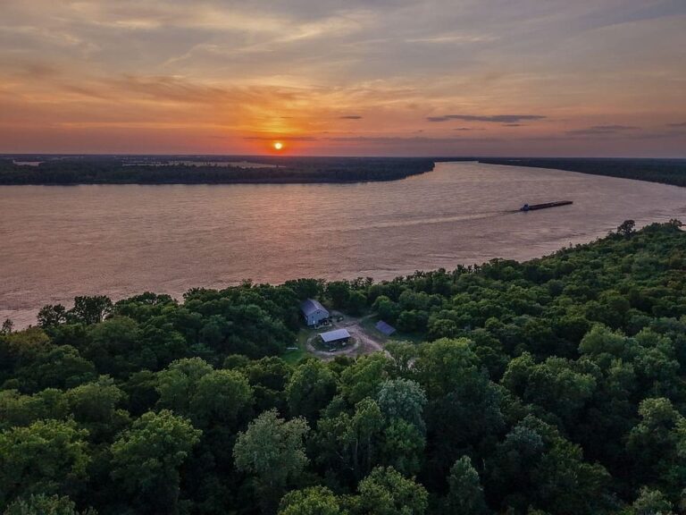 Check out that porch!! 1,150 riverfront acres in Missouri. $5,900,000.