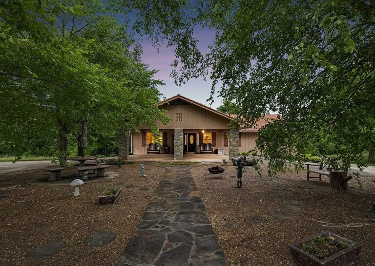 Stunning stone fireplace! Over 19 private acres in Tennessee. $1,250,000.