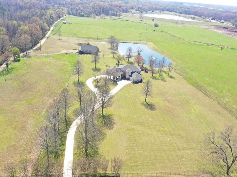 Stunning stables and 15-foot ceilings! Over 12 luxury equestrian acres in Tennessee. $1,775,000.