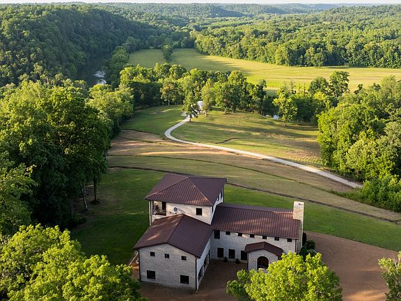 Ultimate Luxury Meets Fortress Security on 161 Riverfront Acres in Tennessee!
