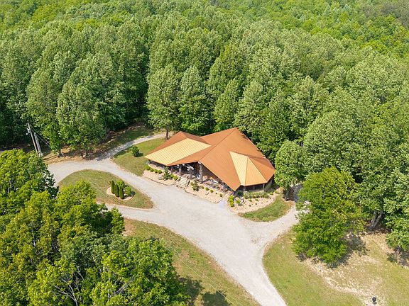 Check out the kitchen!! Custom lodge on 94 pristine acres in Tennessee. $2,890,000.