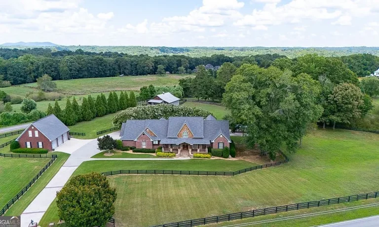 Stunning stone fireplaces! C. 1999 luxury home in North Georgia. $1,500,000.