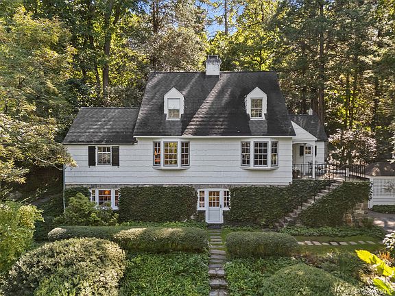Timeless woodwork! Great porch! C. 1935 in New York. $1,240,000.